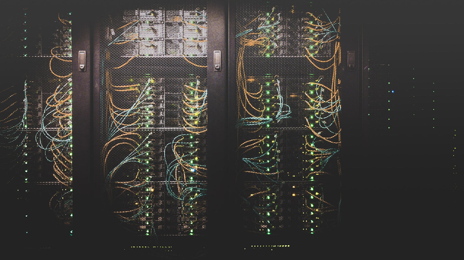 Rows of servers in a data center, representing the compute cost of LLM workflows